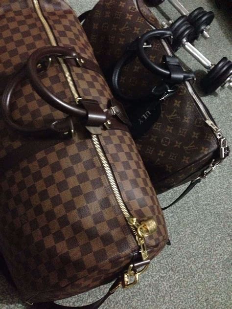 spotting a fake louis vuitton keepall|how to check for false Louis Vuitton.